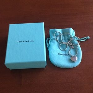 Tiffany & Co engraved I Love You locket